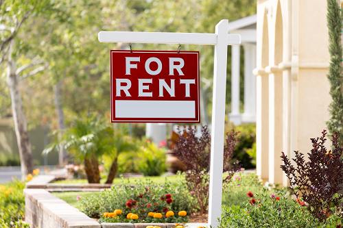 close up of a for rent sign
